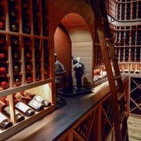 Angled view from other side of the wine storage in this custom wine cellar from Dallas- Fort Worth home