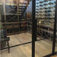 Show off your custom wine cellar with bronze doors.