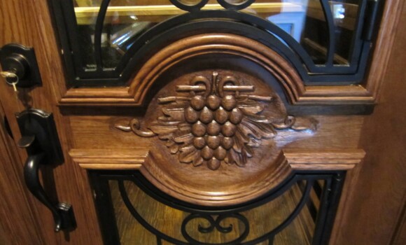 Custom Wine Cellar - McKinney Nr Dallas, Texas - Close up of hand carved grapevine design
