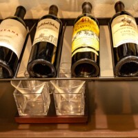 7 - Metal wine racks held the wines for consumption and entertaining
