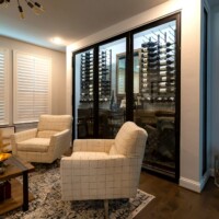 8 - This small wine cellar design includes a 3-door, double insulation glass panels with metal framing
