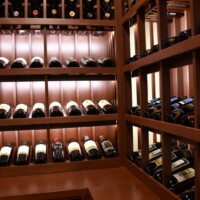 The initial concept of this residential wine cellar in Dallas was to maximize storage. So imagine all standard 750s. But the owner wanted to spice it up eventually, hence the present design.