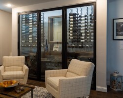 In a transitional-style wine cellar design, you can expect a combination of traditional and modern materials like what you see in this closet!